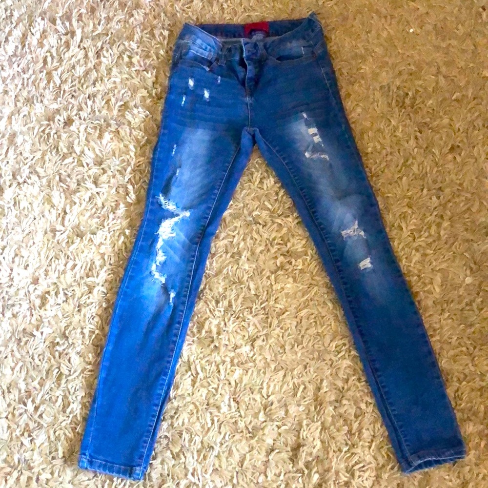 Blue ripped skinny jeans
